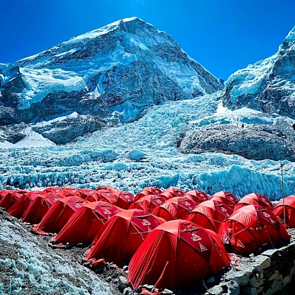 Mount Everest season opens late, with climbers undeterred by huge ice block and high travel costs