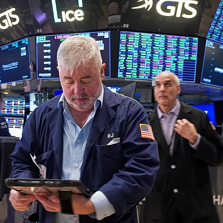 US stocks hold near their records as crude oil prices fall again