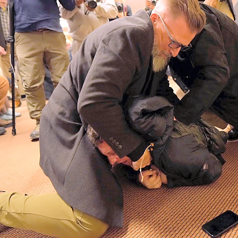 Man who sprayed vinegar at Rep. Ilhan Omar during town hall pleads guilty to assault