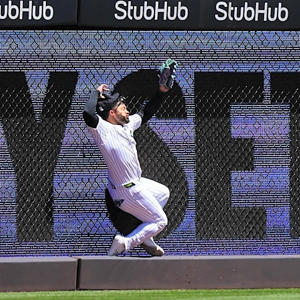 Yankees' Jasson Domínguez sprains shoulder crashing into wall, leading to Spencer Jones call-up