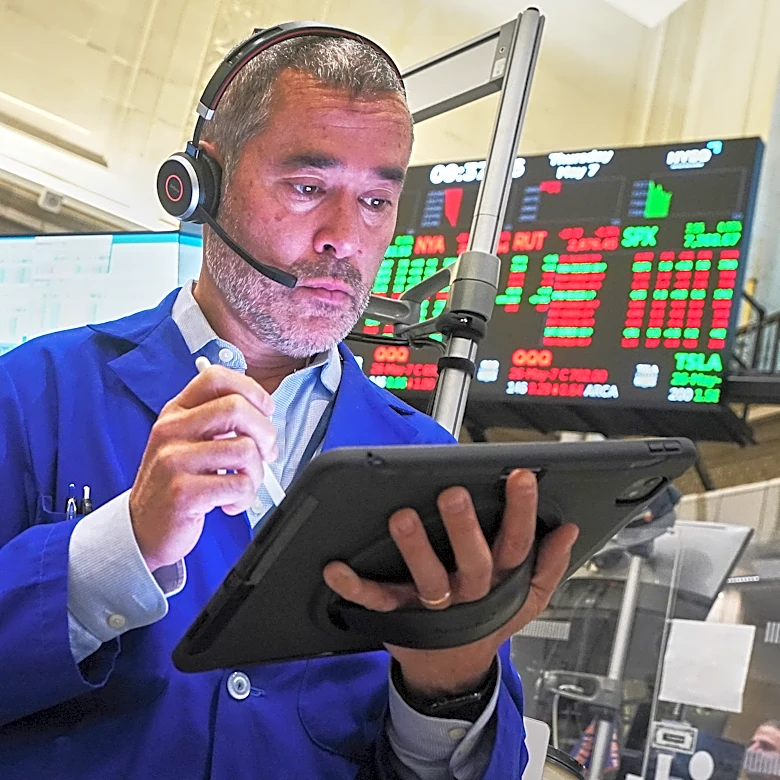 US stocks rise toward records as the job market holds up better than expected despite the Iran war