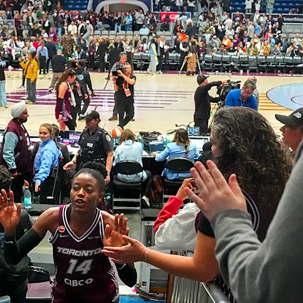 Toronto's first WNBA game is no thing of beauty, but sellout crowd finds plenty to cheer
