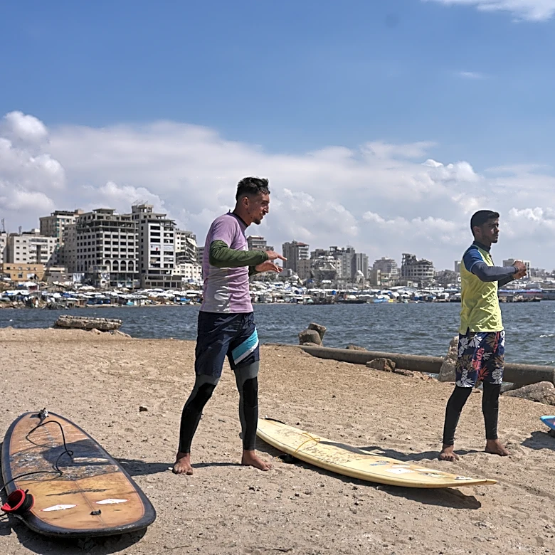 Surfers in war-torn Gaza find rare moments of joy taking to the waves