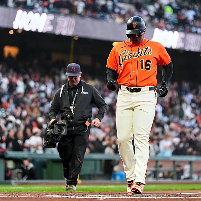 Rafael Devers goes deep and Robbie Ray pitches the Giants to a 5-2 win over the Pirates