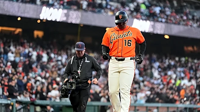Rafael Devers goes deep and Robbie Ray pitches the Giants to a 5-2 win over the Pirates
