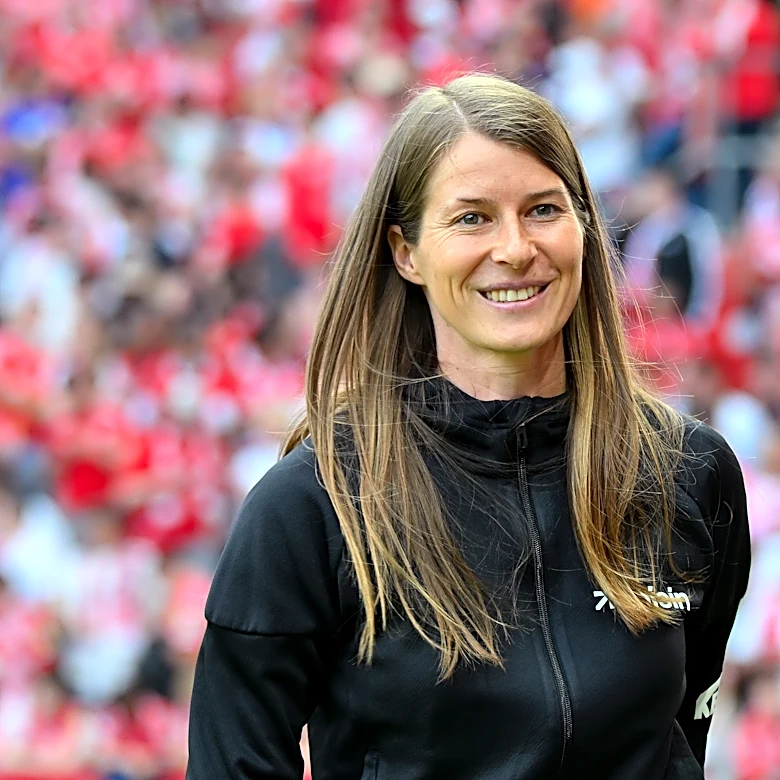 Marie-Louise Eta becomes first female head coach to win a Bundesliga game