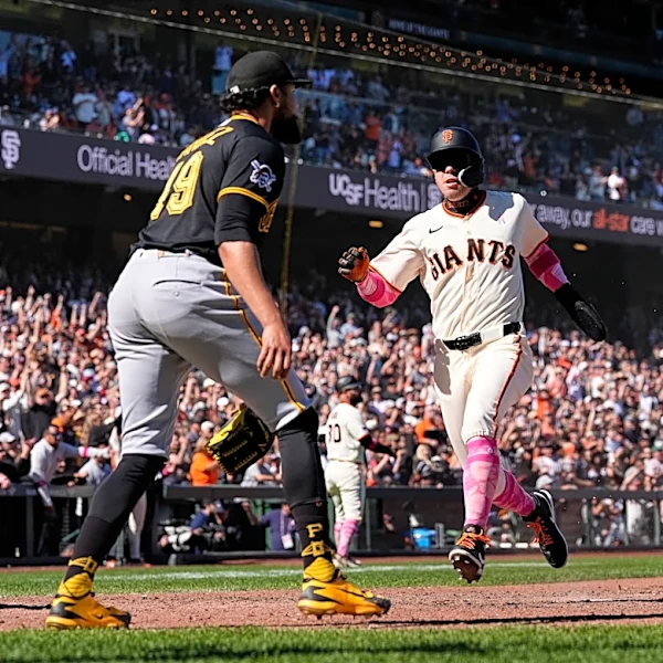 Jesús Rodríguez's RBI single helps the Giants rally to beat the Pirates 7-6 in 12 innings
