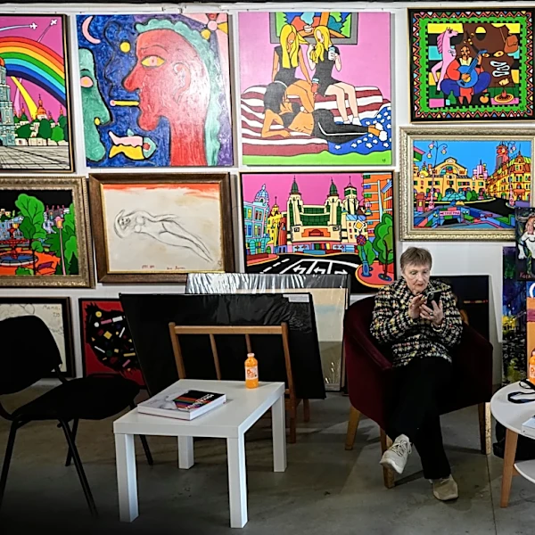 Ukrainians seeking cultural escape from war’s brutality find comfort and resilience at Kyiv art fair
