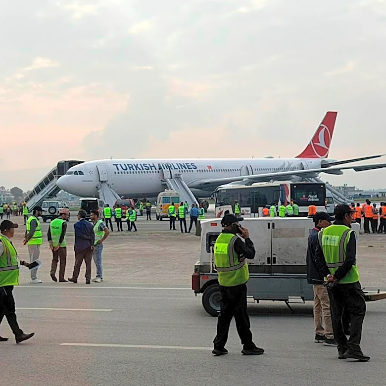 Turkish Airlines passengers slide to safety after jet catches fire in Kathmandu