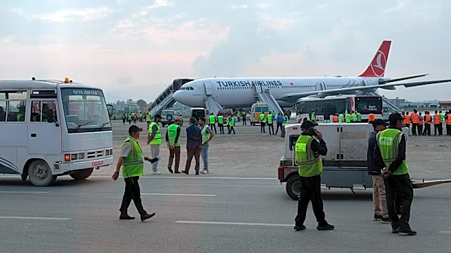 Turkish Airlines passengers slide to safety after jet catches fire in Kathmandu