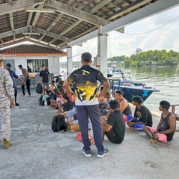 Malaysia searches for 14 missing Indonesians after a migrant boat sinks
