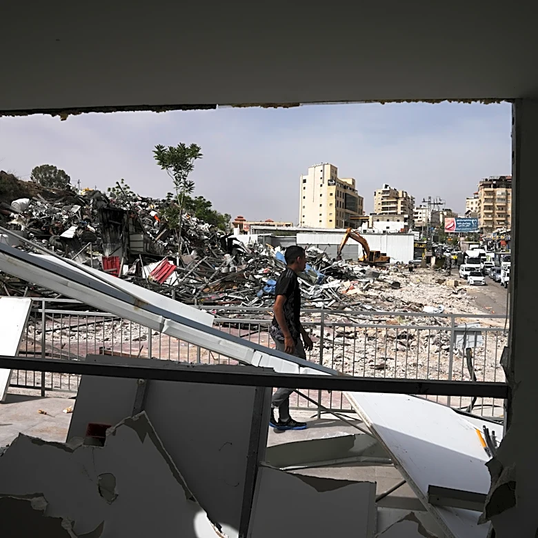 Israeli bulldozers raze about 50 Palestinian shops ahead of settlement-linked road project