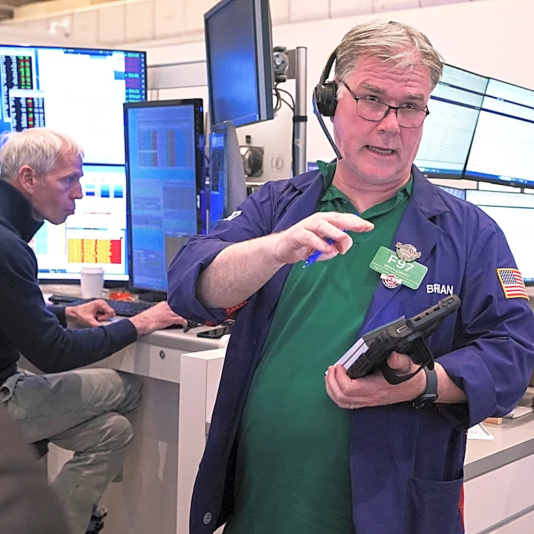 Wall Street falls from its records as AI stocks slump and oil prices rise