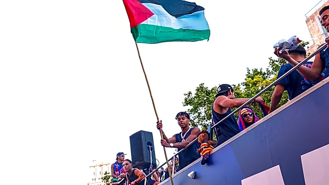 Barcelona star Lamine Yamal waves Palestinian flag during title parade