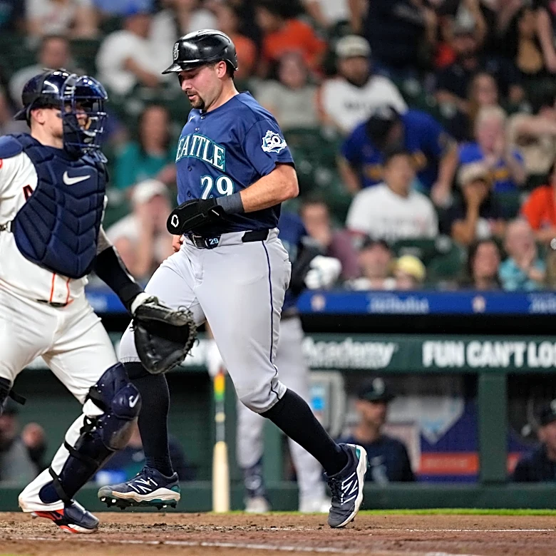 Cal Raleigh tried a full-uniform shower. The next night, his bat finally woke up