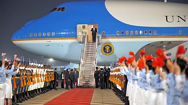 The Latest: Trump arrives in China to meet with Xi in Beijing