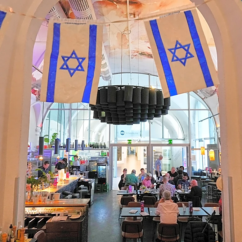 A Vienna cafe offers a welcome for Israel supporters as tensions brew at the Eurovision Song Contest