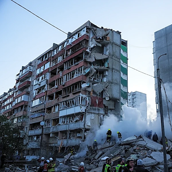 Russia hammers Ukraine for a 3rd straight day, flattening a Kyiv apartment block and killing 7