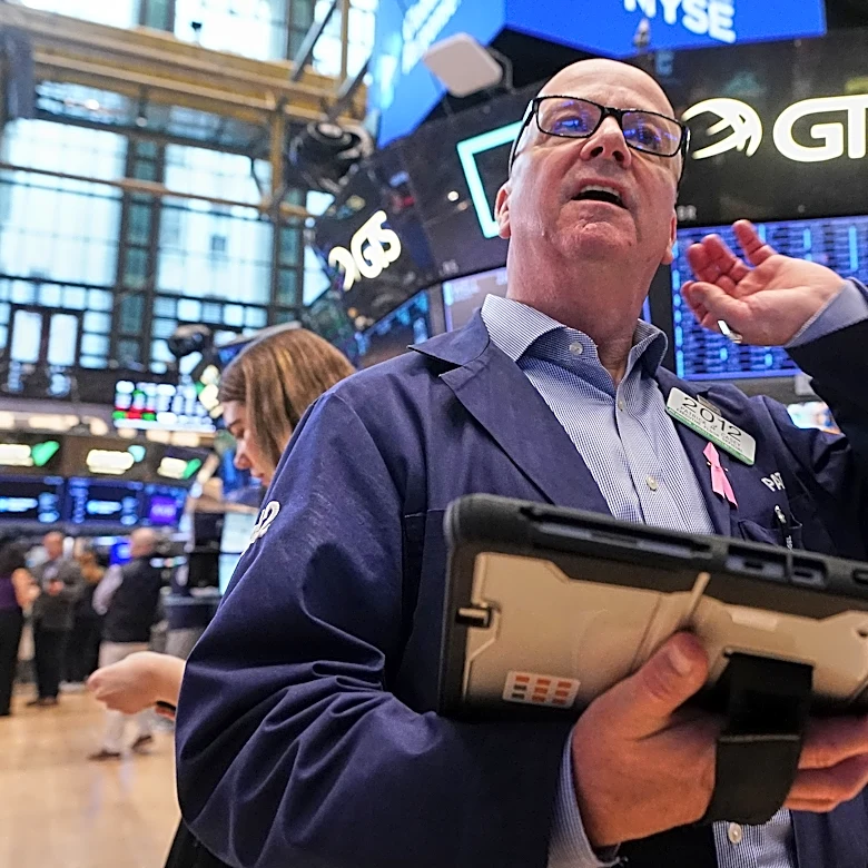 Sinking AI stocks knock Wall Street off its records as markets drop worldwide on inflation worries