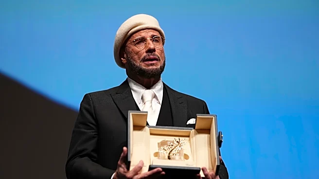 John Travolta surprised with honorary Palme d'Or at Cannes Film Festival