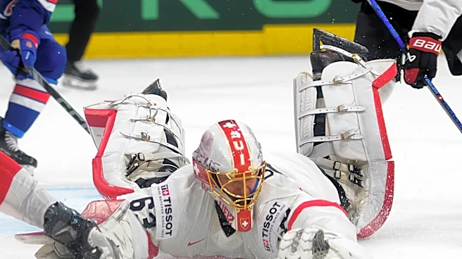 Switzerland beats defending champion the US in ice hockey worlds opener