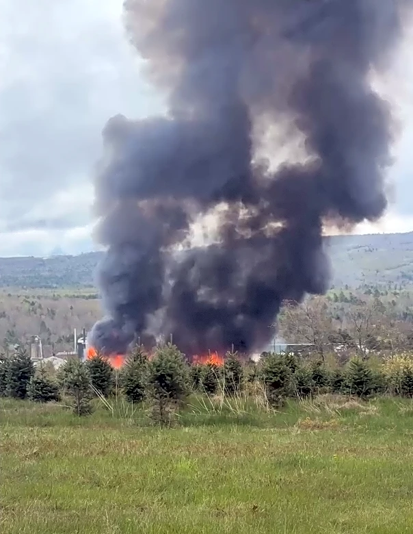 Firefighter killed, 11 injured in lumber mill explosion and massive fire in Maine