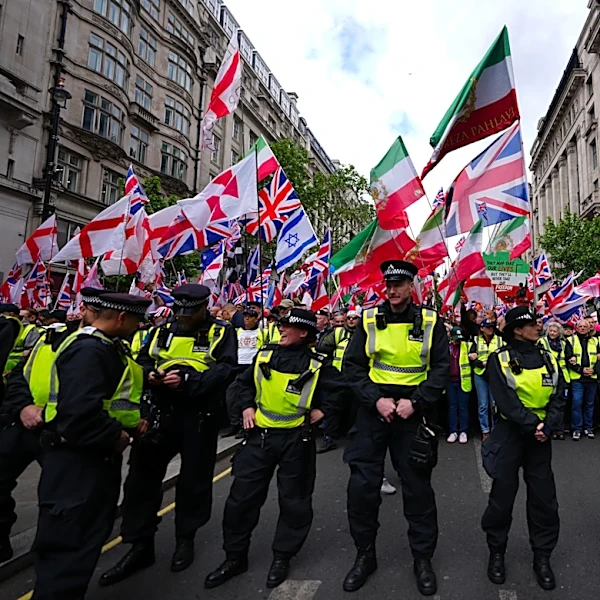 London police out in force dealing with rival rallies and a soccer final