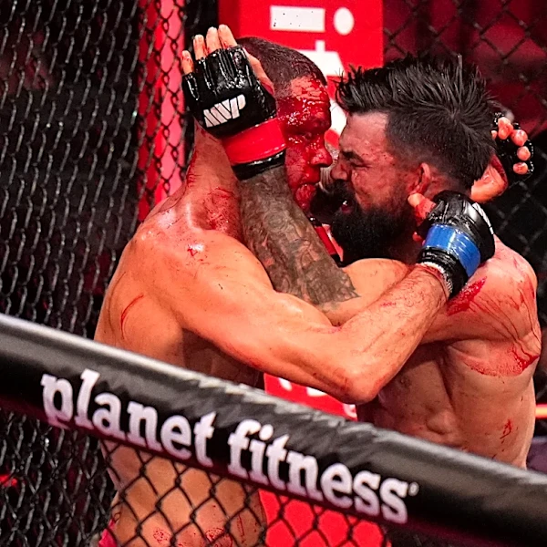 Mike Perry bloodies and beats Nate Diaz in 2 rounds on Rousey-Carano undercard
