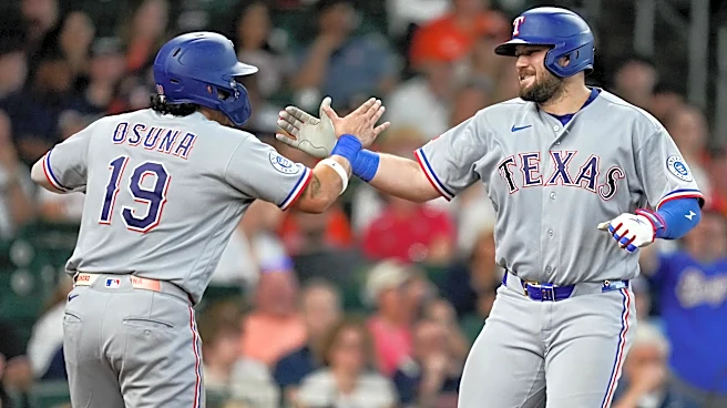 Burger blasts a homer, drives in 4 as Eovaldi powers the Rangers past the Astros 8-0