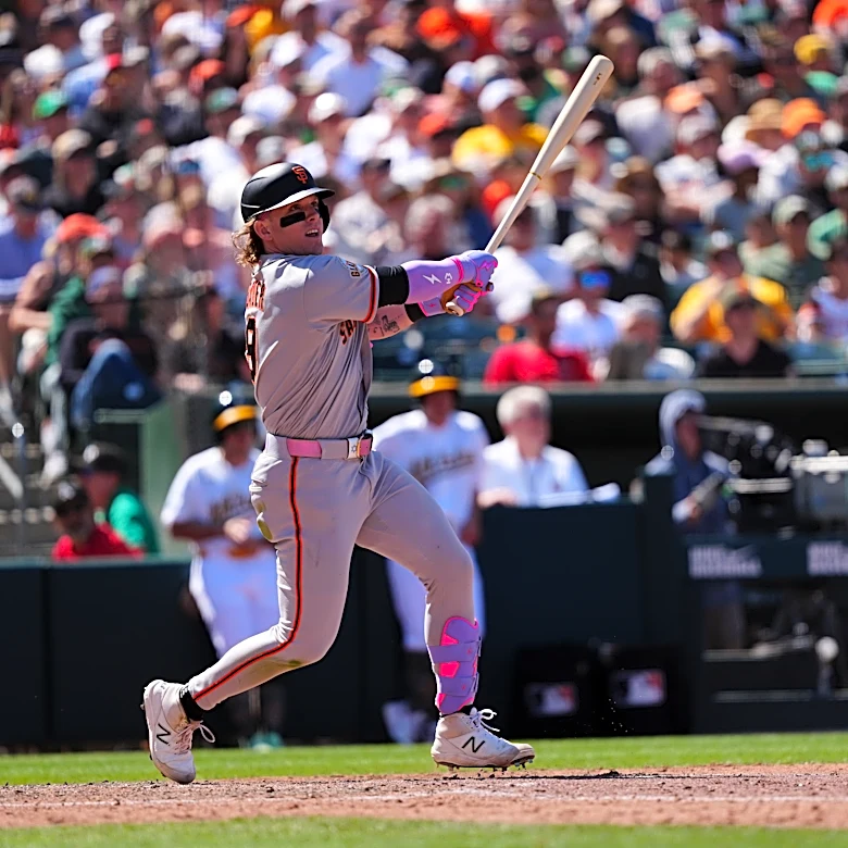 Bader's wind-aided grand slam helps Giants breeze to 10-1 victory over Athletics
