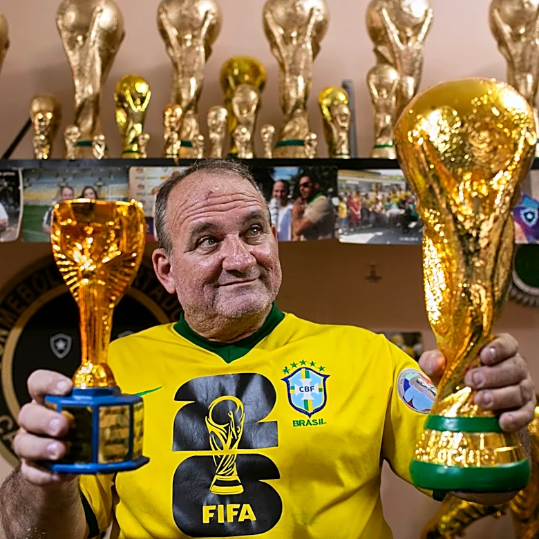Brazilian artisan crafts replica World Cup trophies to the joy of locals and celebrities alike