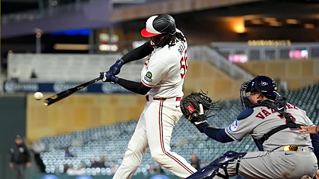 Josh Bell homers twice as Twins beat Astros 6-3 in game delayed nearly 2 hours by rain