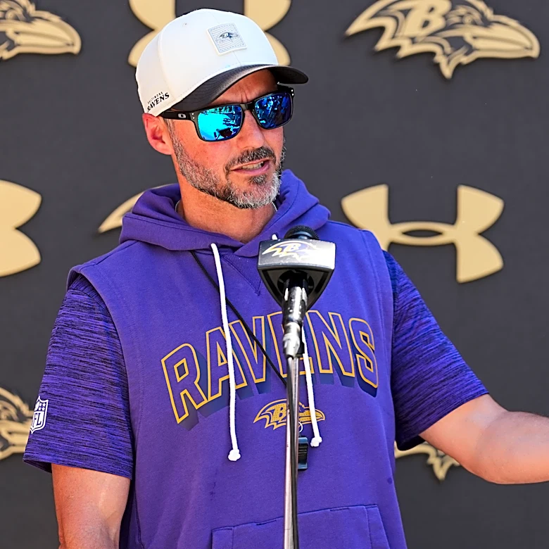 Ravens coach shrugs off Lamar Jackson's absence at voluntary practice, says he'll be back soon