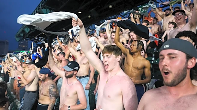 Shirtless fans the stars at MLB stadiums as "Tarps Off" trend sweeps baseball world