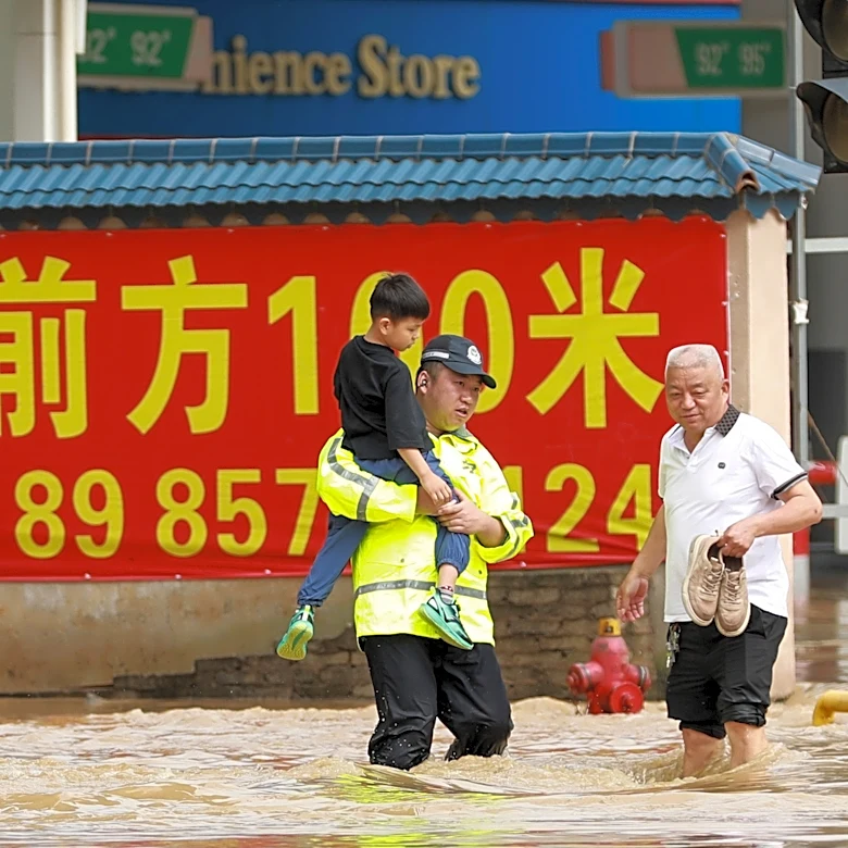 Torrential rain and floods batter China, killing at least 12 and forcing mass evacuations