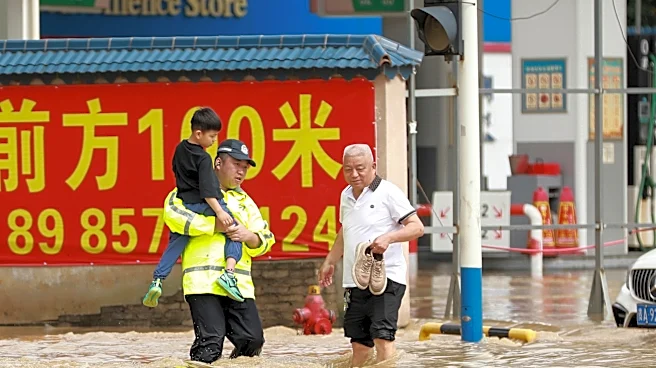 Torrential rain and floods batter China, killing at least 12 and forcing mass evacuations