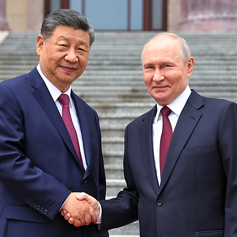 Putin and Xi hail their friendship and growing energy trade at their meeting in Beijing
