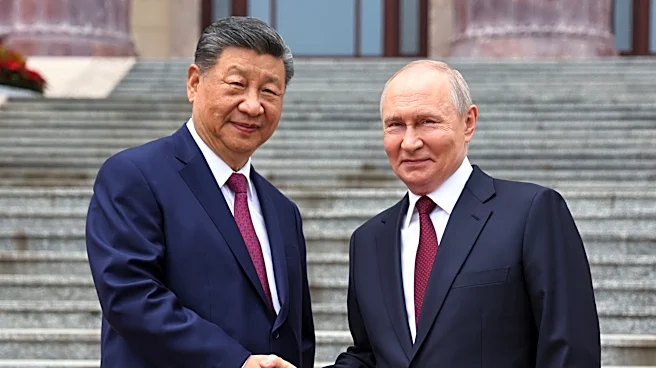 Putin and Xi hail their friendship and growing energy trade at their meeting in Beijing