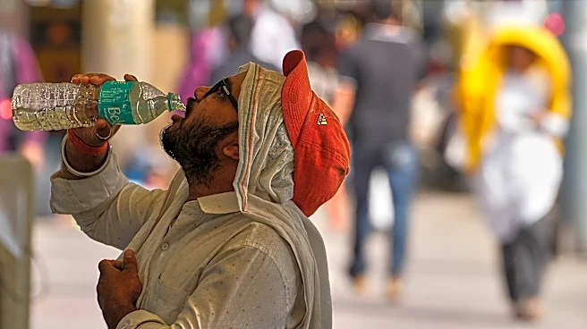 Heat wave empties roads and markets in north India as some farmers turn to nighttime work