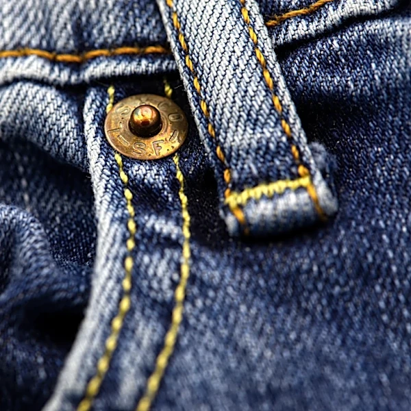 Through much of the American experience, blue jeans have been a common thread