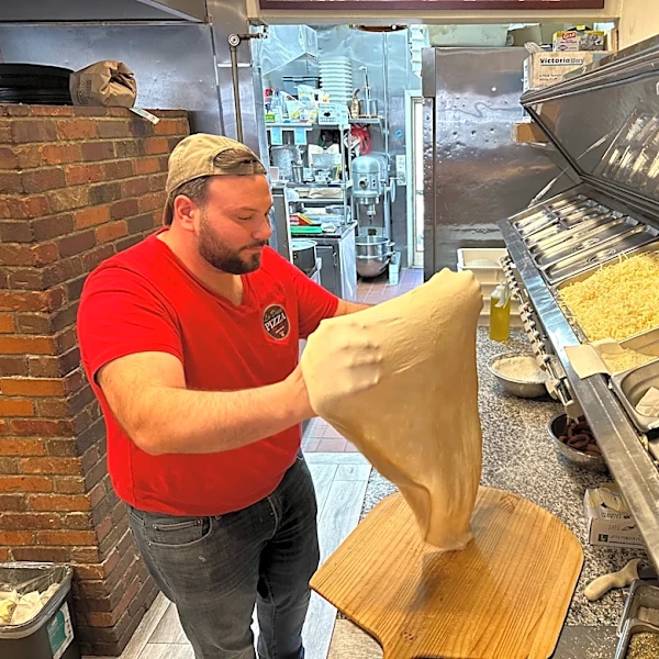 A proposed additive ban could change New York’s pizza and bagels, some say for the better