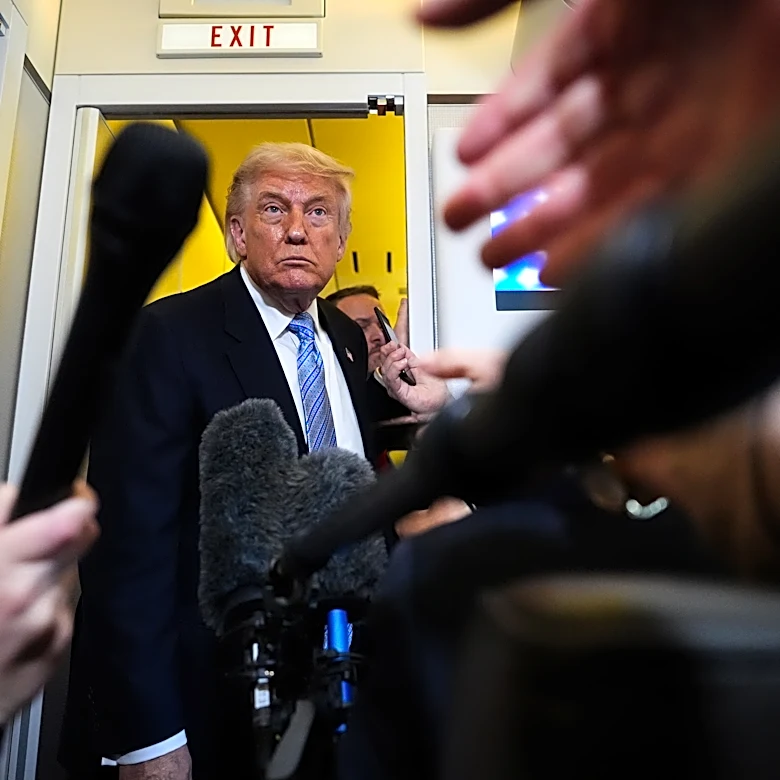 The Latest: Trump heads to a competitive New York district as voters sour on the economy
