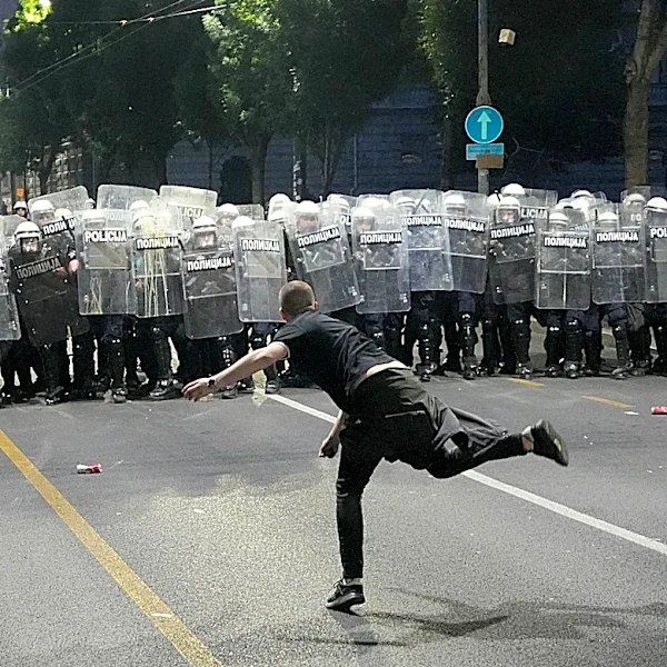 Protesters clash with police after an anti-government rally in Serbia's capital