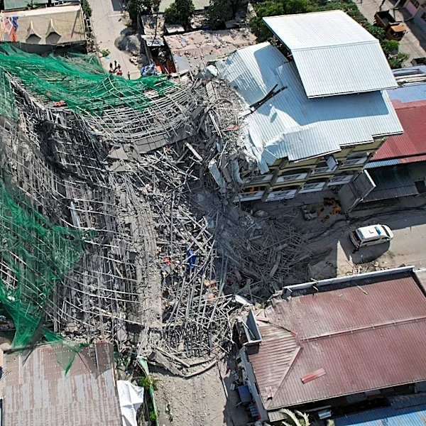 Building under construction in Philippines collapses, leaving 1 dead and 21 trapped