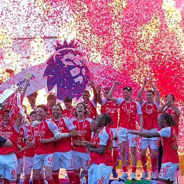 Kroenkes enjoy 'magical' title win as Arsenal's players finally get hands on Premier League trophy