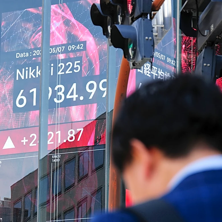 Global shares gain and oil prices fall after Trump says talks on ending the war are proceeding