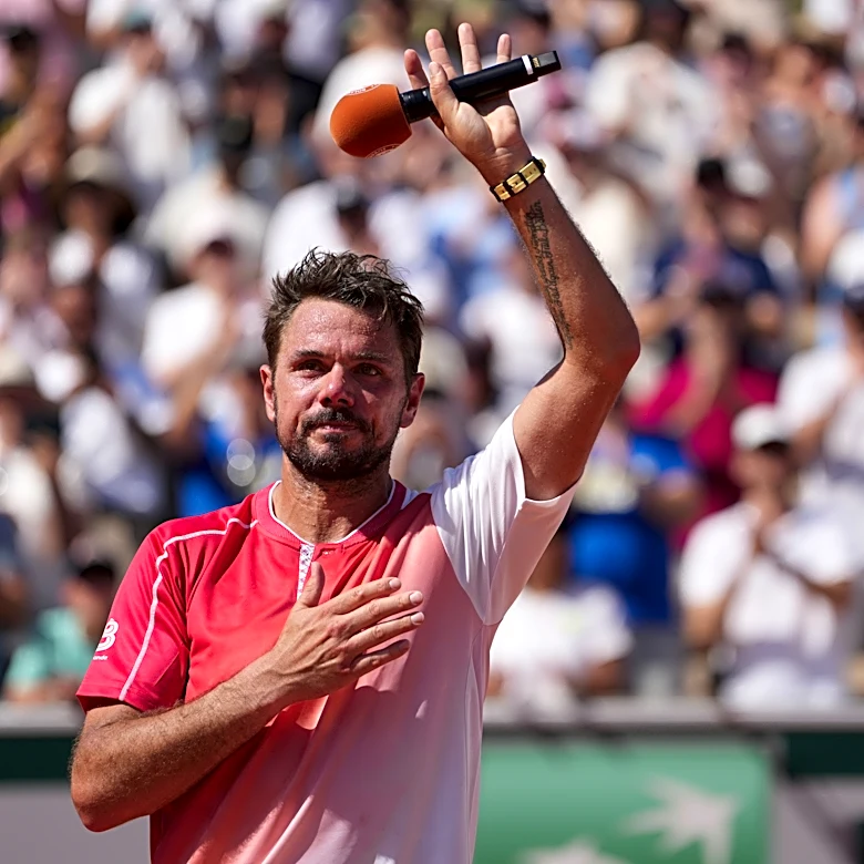 Wawrinka waves emotional goodbye to French Open after losing in first round