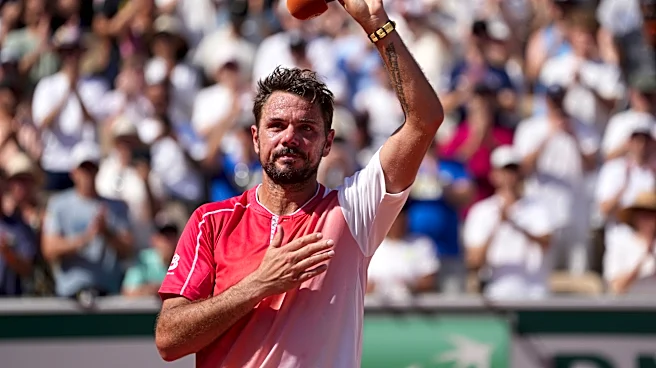 Wawrinka waves emotional goodbye to French Open after losing in first round