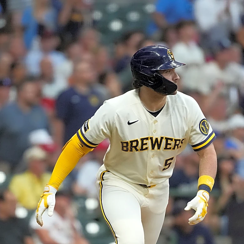 Mitchell hits a three-run HR to back Harrison's strong start as the Brewers beat the Cardinals 6-0