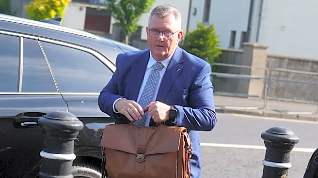 Northern Ireland's former unionist leader faces trial in sexual abuse case involving 2 girls